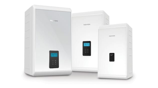 Navien NCB300 combi boiler installed on a wall in a modern home